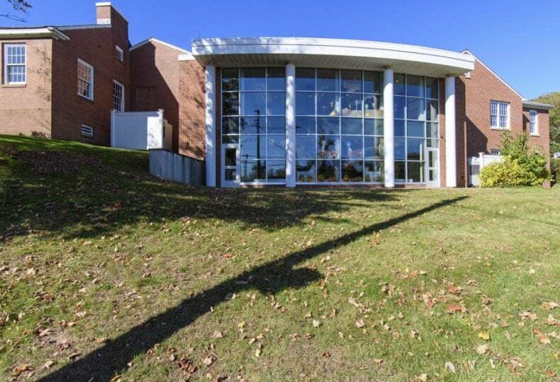 Outdoor photo of the backside of Edward Smith Library