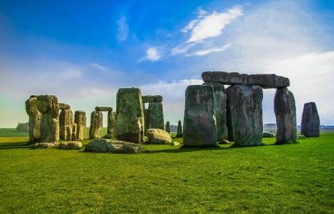 Horizontal photo of Stonehenge on a sunny day.