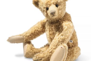 An old fashioned tan stuffed teddy bear